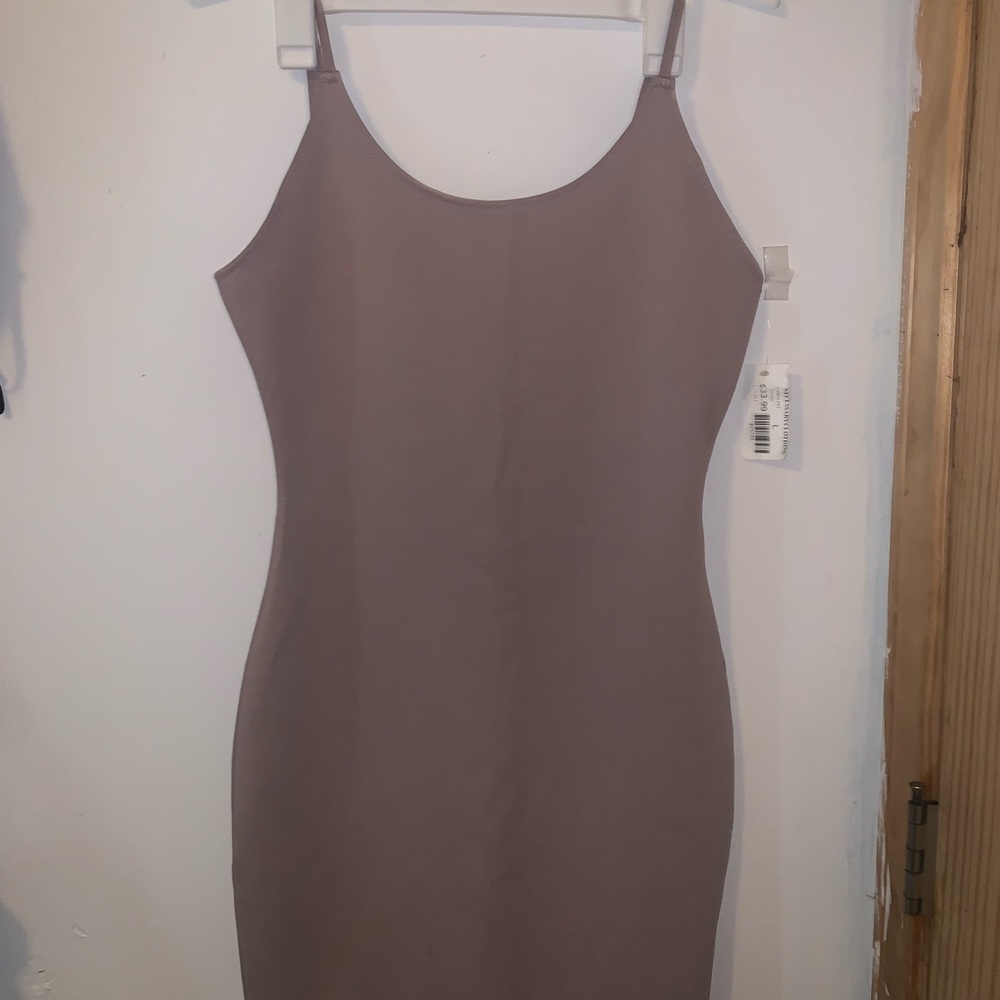 Cute large cream dress.